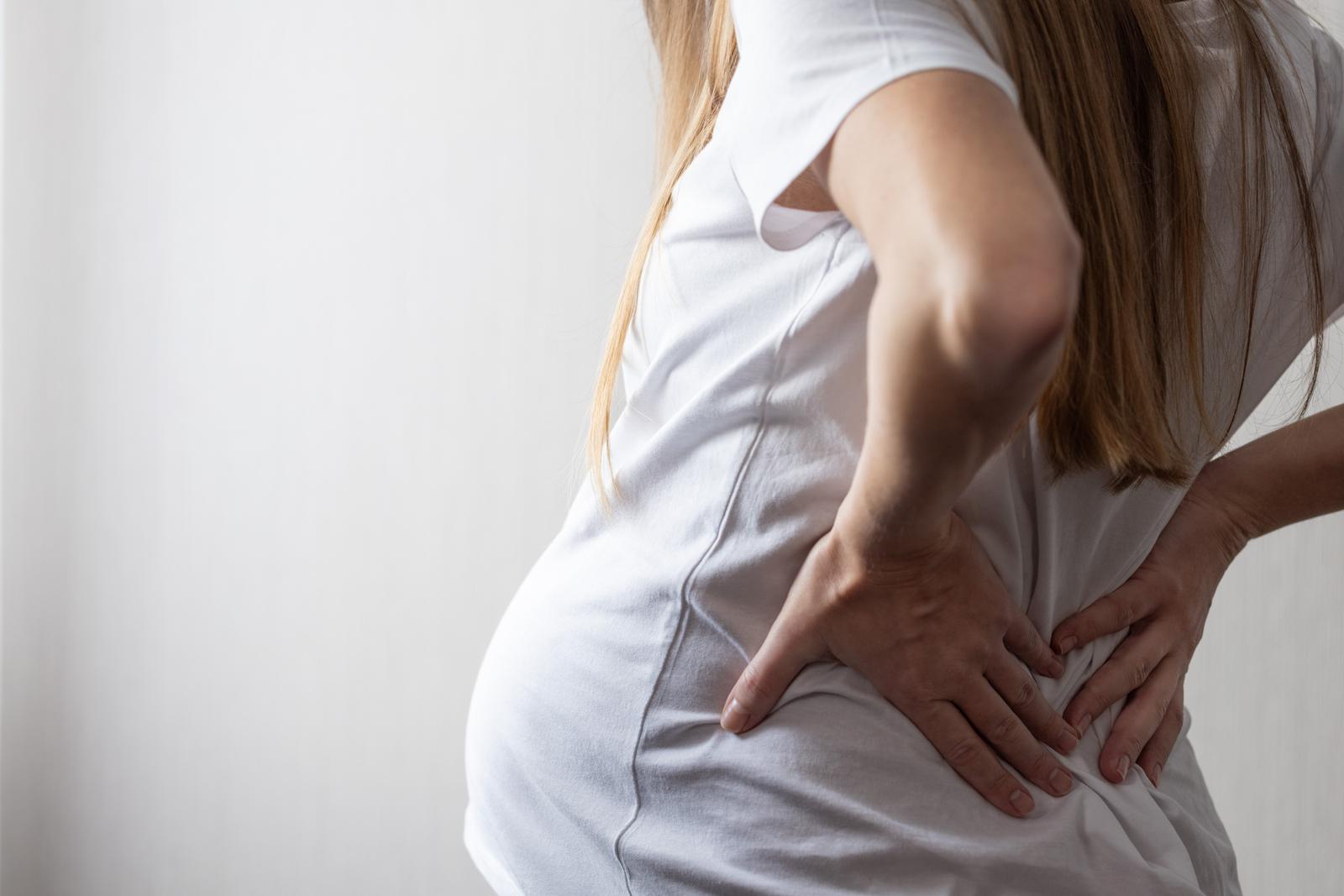 pain.jpgWoman holding her lower back in pain, a common complaint treated through osteopathy. pain.jpgWoman holding her lower back in pain, a common complaint treated through osteopathy.