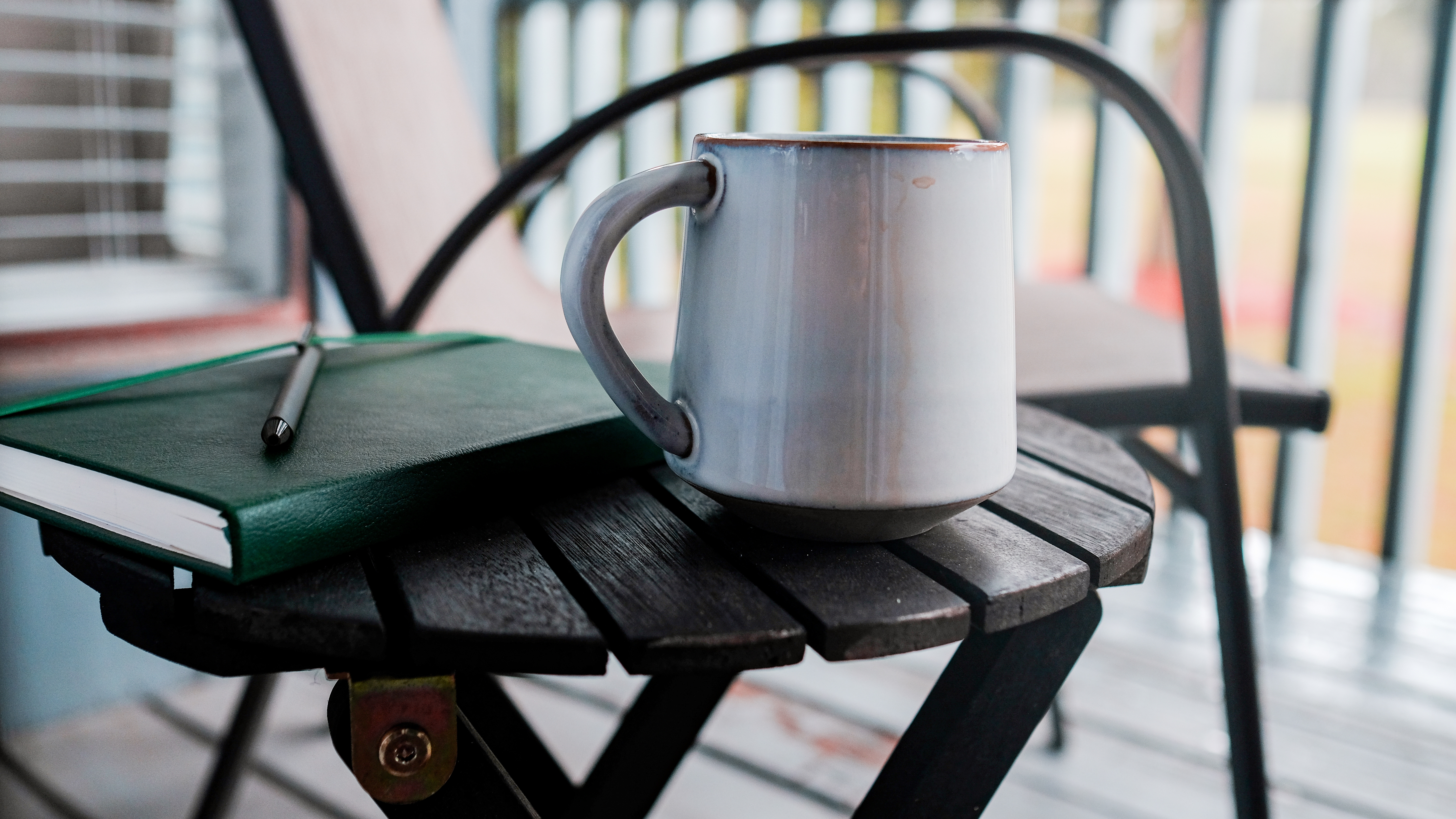 Warm mug beside a journal and pen, representing personal reflection on family-of-origin patterns and emotional wellbeing. Warm mug beside a journal and pen, representing personal reflection on family-of-origin patterns and emotional wellbeing.