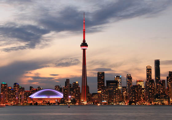Toronto evening skyline, including the CN Tower and Roger's Centre